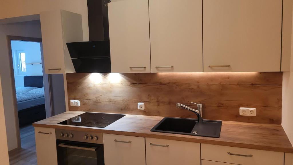 Kuchyň nebo kuchyňský kout v ubytování Franzis Appartments Franz