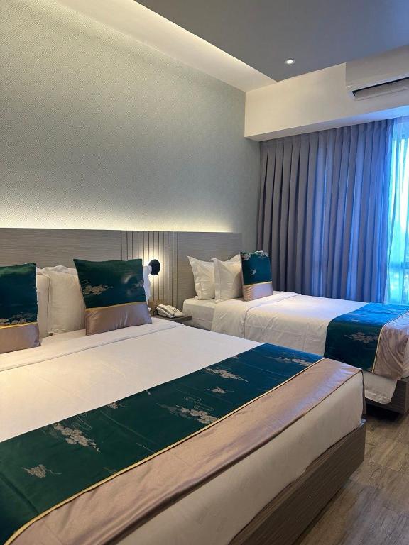 Postel nebo postele na pokoji v ubytování Badsbrotel Suites