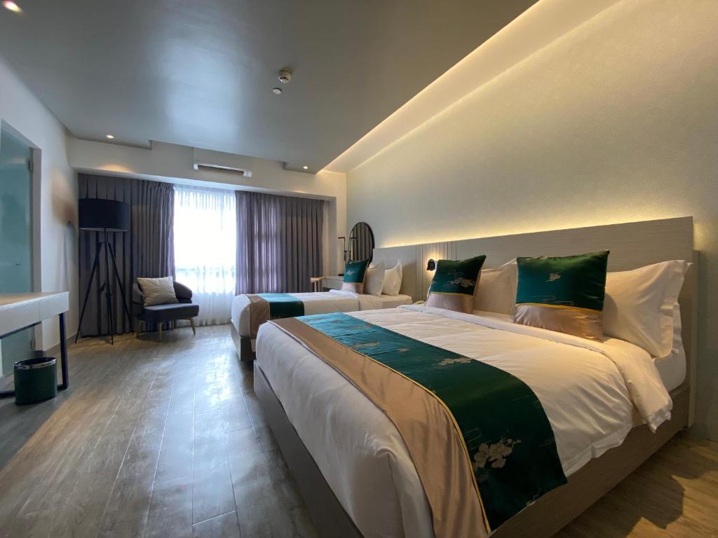 Postel nebo postele na pokoji v ubytování Badsbrotel Suites
