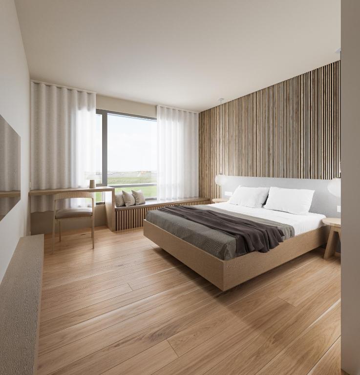 Postel nebo postele na pokoji v ubytování Hotel Loa