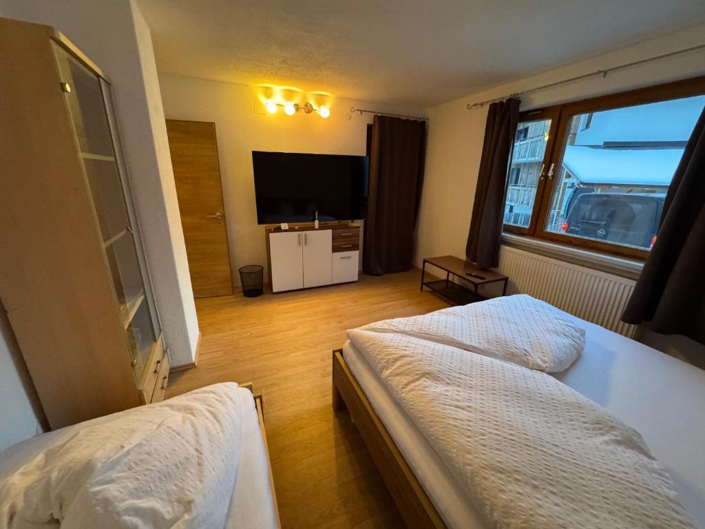 Postel nebo postele na pokoji v ubytování Apart Weitblick Suite