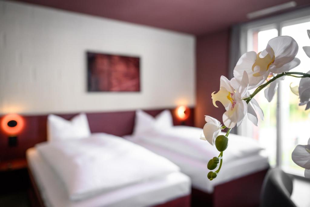 Letto o letti in una camera di BRIX - Self Check-In Hotel
