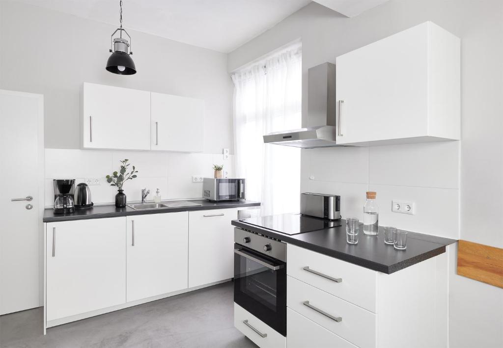 OLD PRINTING HOUSE - Modern I City I 2 Min HBF I E-Ladesäule - Resim 21