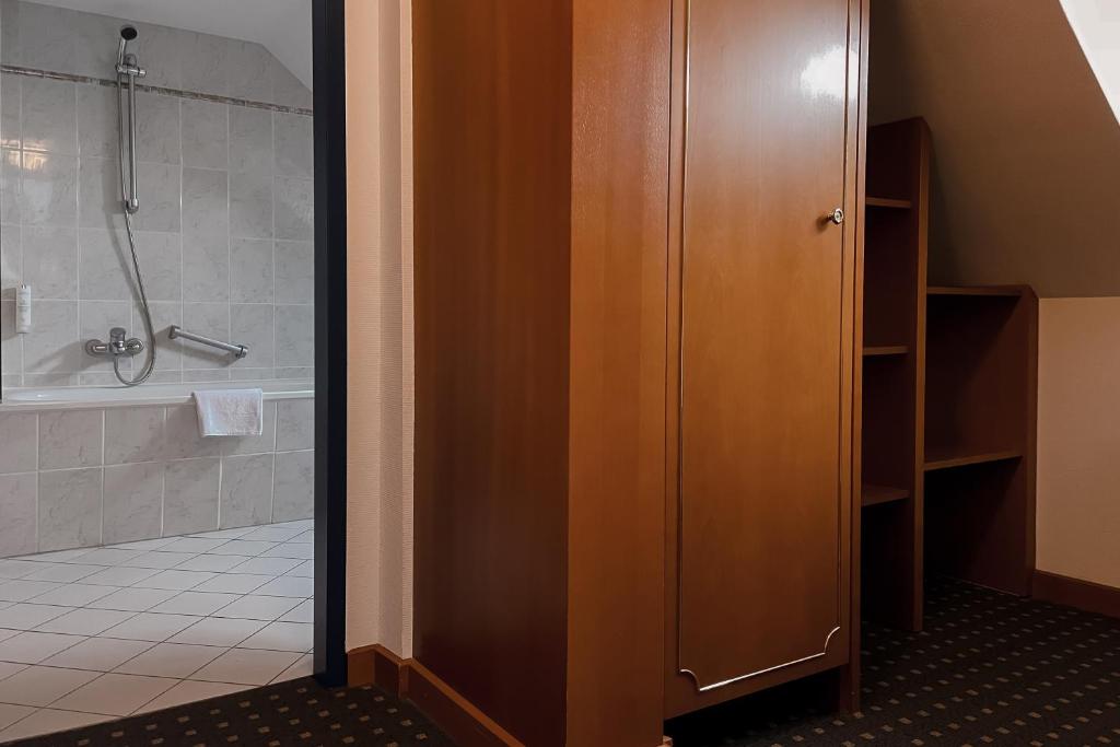 Koupelna v ubytování Hotel Alekto