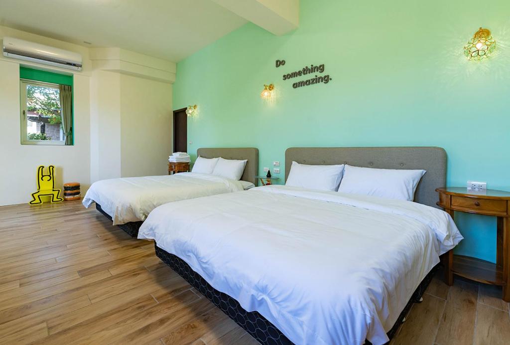 Postel nebo postele na pokoji v ubytování Magi Castle Family B&B
