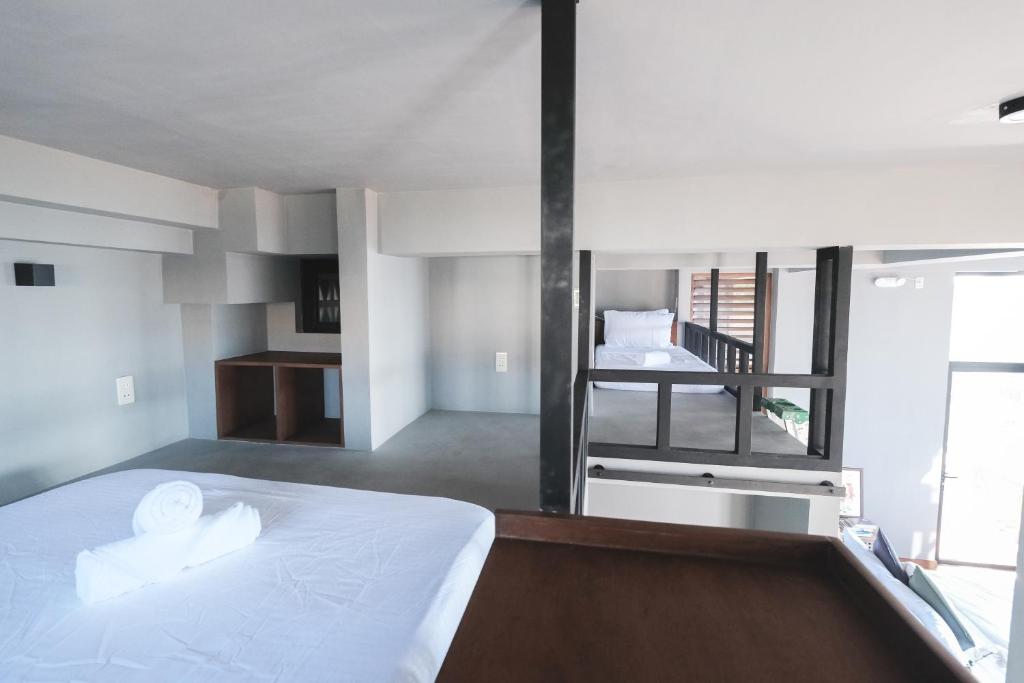 Postel nebo postele na pokoji v ubytování Terrace Suite