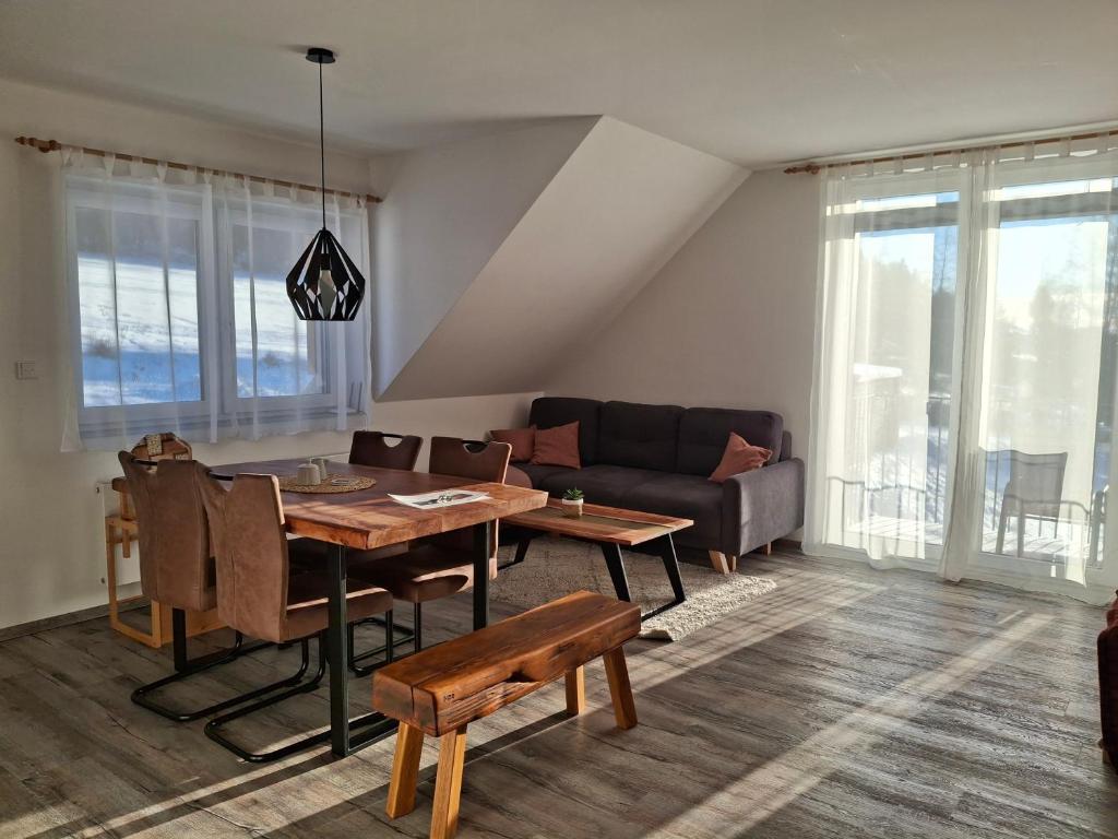 Posezení v ubytování Apartmán U Mamuta