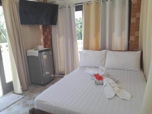 Postel nebo postele na pokoji v ubytování Marnin's Place