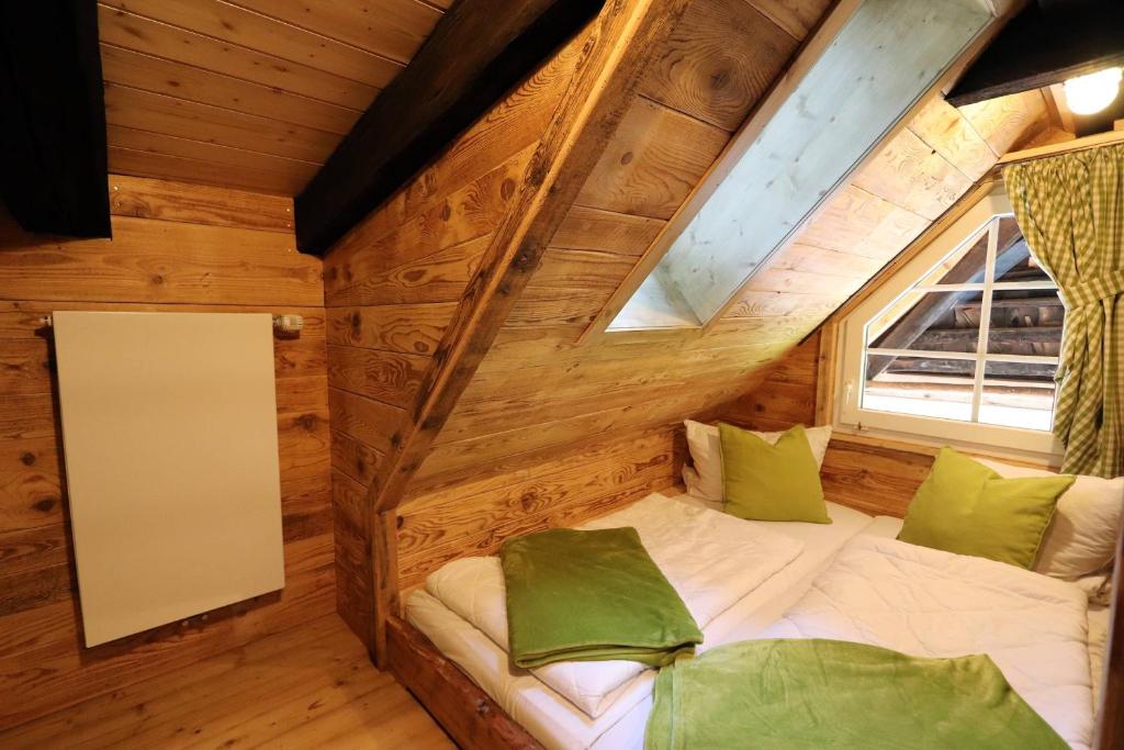Postel nebo postele na pokoji v ubytování Ferienhütte Biobetrieb Lippenhof