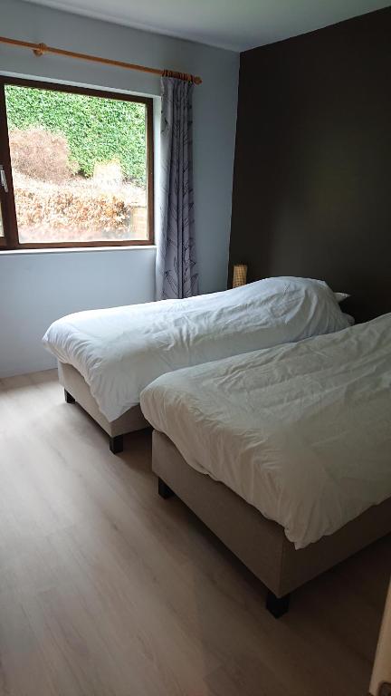 Postel nebo postele na pokoji v ubytování Tregadata guesthouse
