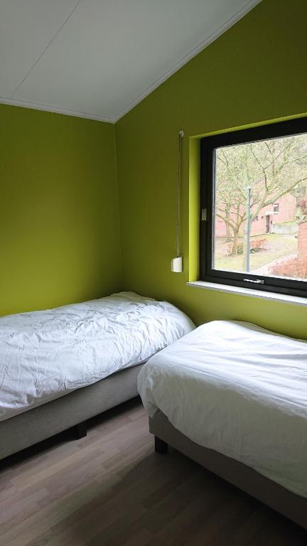 Postel nebo postele na pokoji v ubytování Tregadata guesthouse