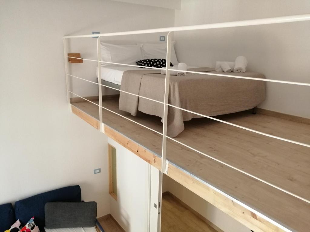 Postel nebo postele na pokoji v ubytování Suite Contè