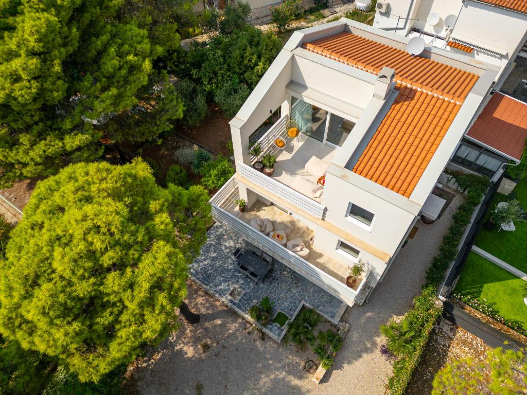 an overhead view of a white house with an orange roof at Villa Vista Rovinj - NEW 2024 ! in Rovinj