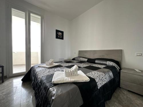 Postel nebo postele na pokoji v ubytování Orizzonte Flat