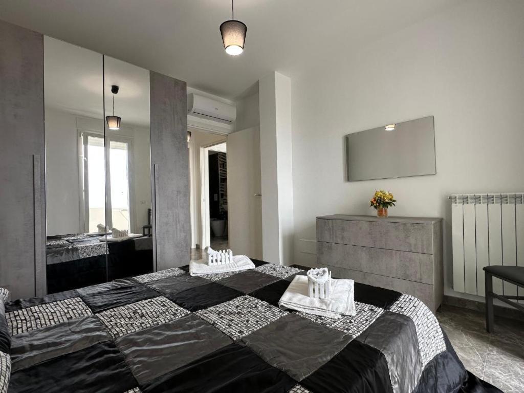 Postel nebo postele na pokoji v ubytování Orizzonte Flat