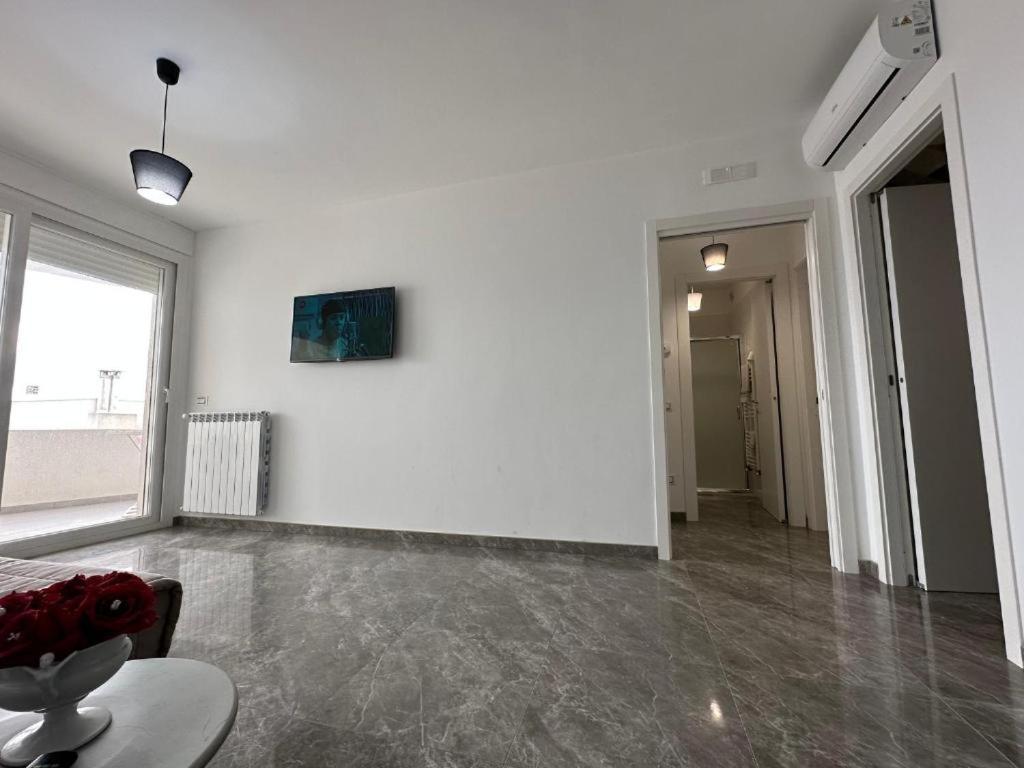TV a/nebo společenská místnost v ubytování Orizzonte Flat