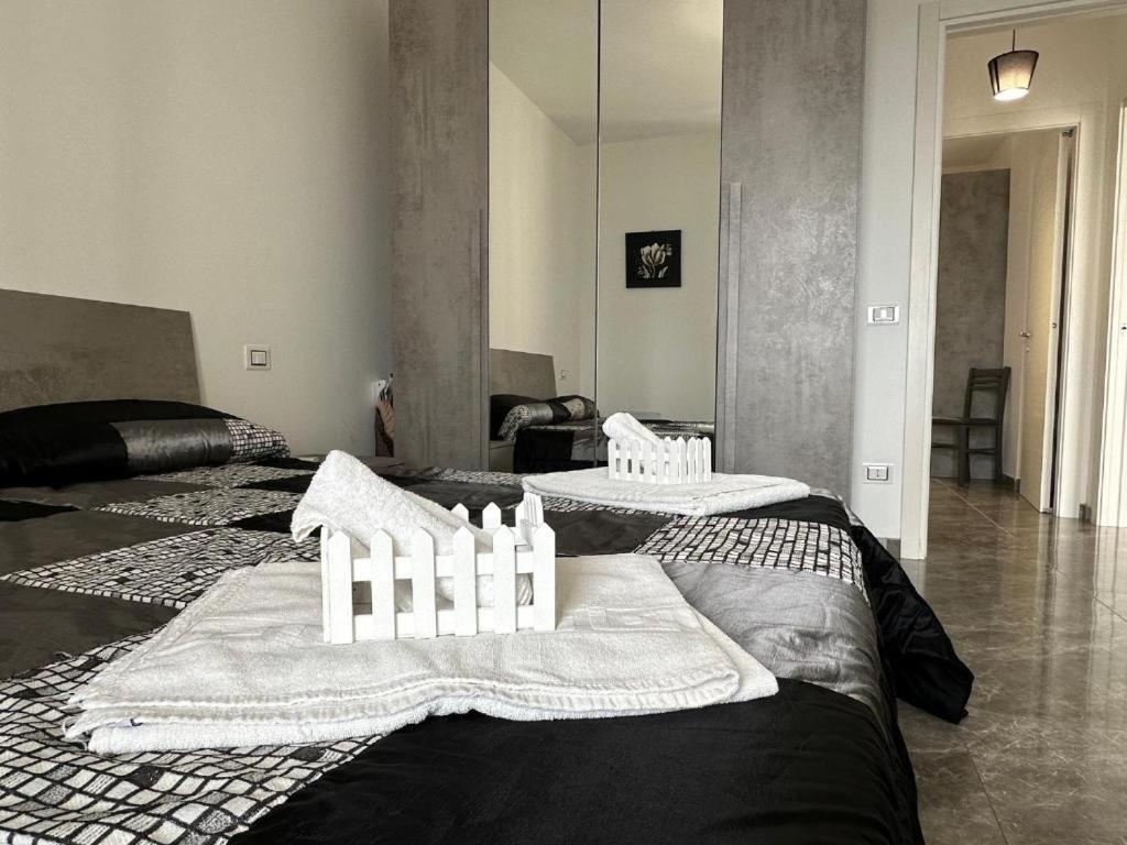 Postel nebo postele na pokoji v ubytování Orizzonte Flat