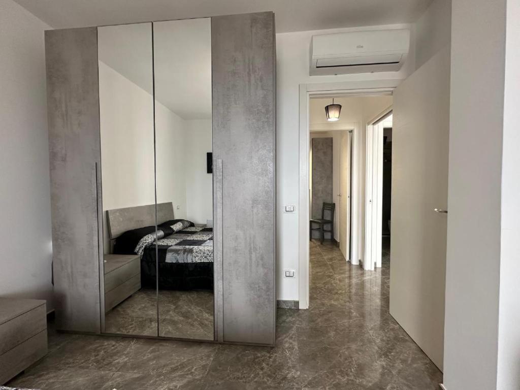 Postel nebo postele na pokoji v ubytování Orizzonte Flat