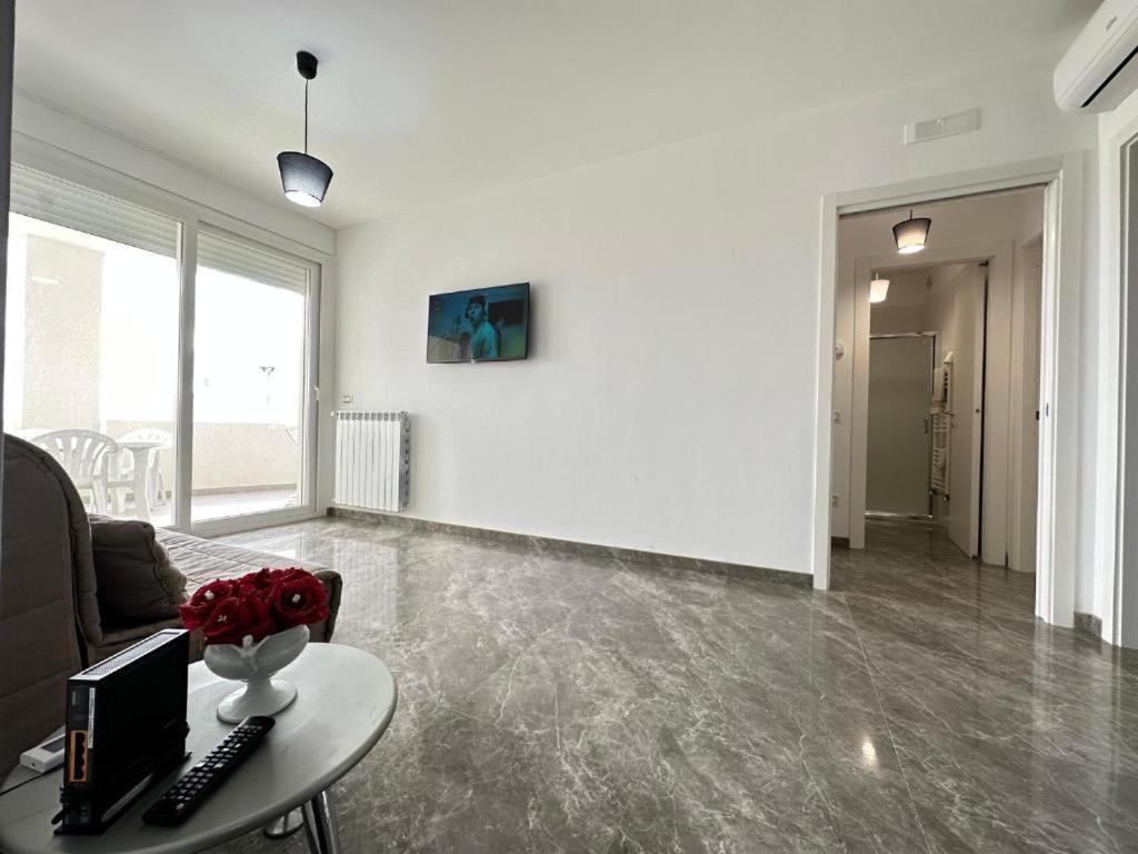 TV a/nebo společenská místnost v ubytování Orizzonte Flat