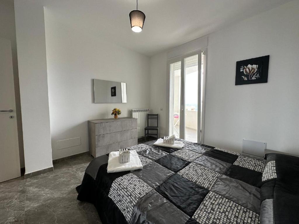 Postel nebo postele na pokoji v ubytování Orizzonte Flat