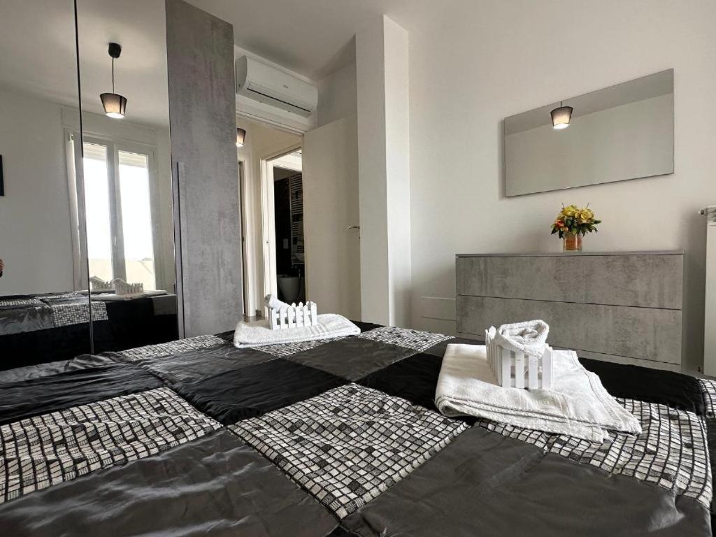 Postel nebo postele na pokoji v ubytování Orizzonte Flat
