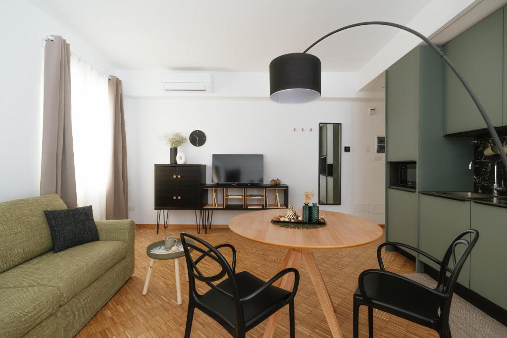 Televízia a/alebo spoločenská miestnosť v ubytovaní Residence Degli Aranci - Casêta