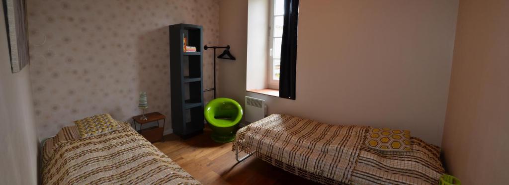 Postel nebo postele na pokoji v ubytování Quasimodo