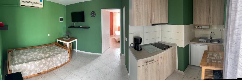 Łóżko lub łóżka w pokoju w obiekcie Apartmani Starcevic