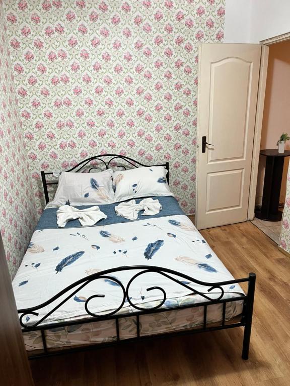 Ένα ή περισσότερα κρεβάτια σε δωμάτιο στο Apartament Ella