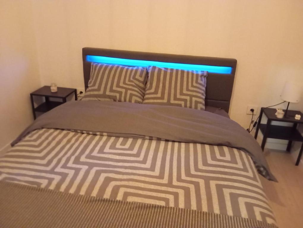 Postel nebo postele na pokoji v ubytování Les charmes de la Kirneck
