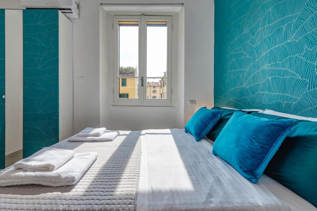 Posteľ alebo postele v izbe v ubytovaní [Navigli - Darsena] La perla in città