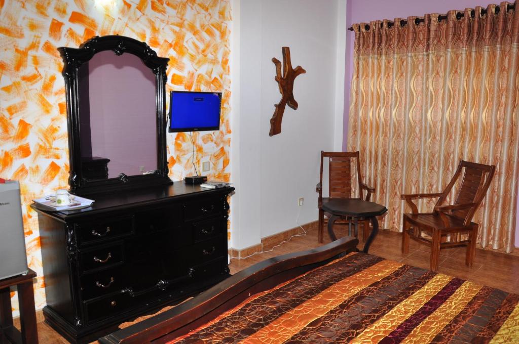 TV a/nebo společenská místnost v ubytování Solomon Beach Hotel