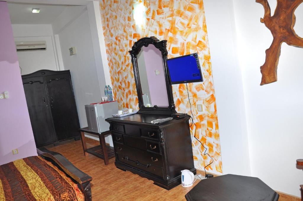 TV a/nebo společenská místnost v ubytování Solomon Beach Hotel
