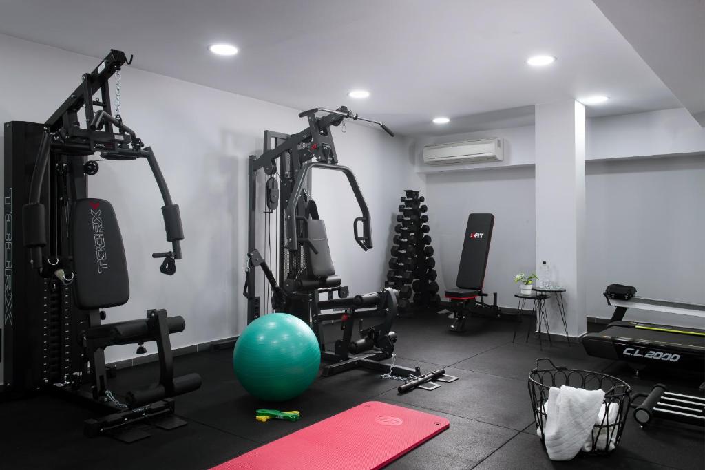 a room with a gym with a green ball in it at Athenian Riviera Hotel& Suites in Athens