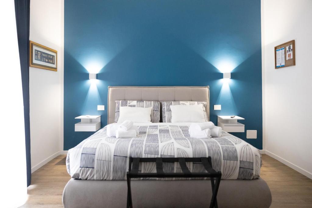 Postel nebo postele na pokoji v ubytování Dama Suite