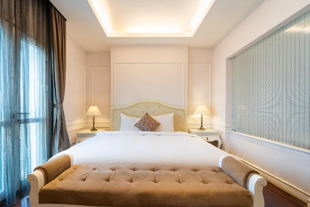 Postel nebo postele na pokoji v ubytování Ha Noi Memory Central Hotel And Spa