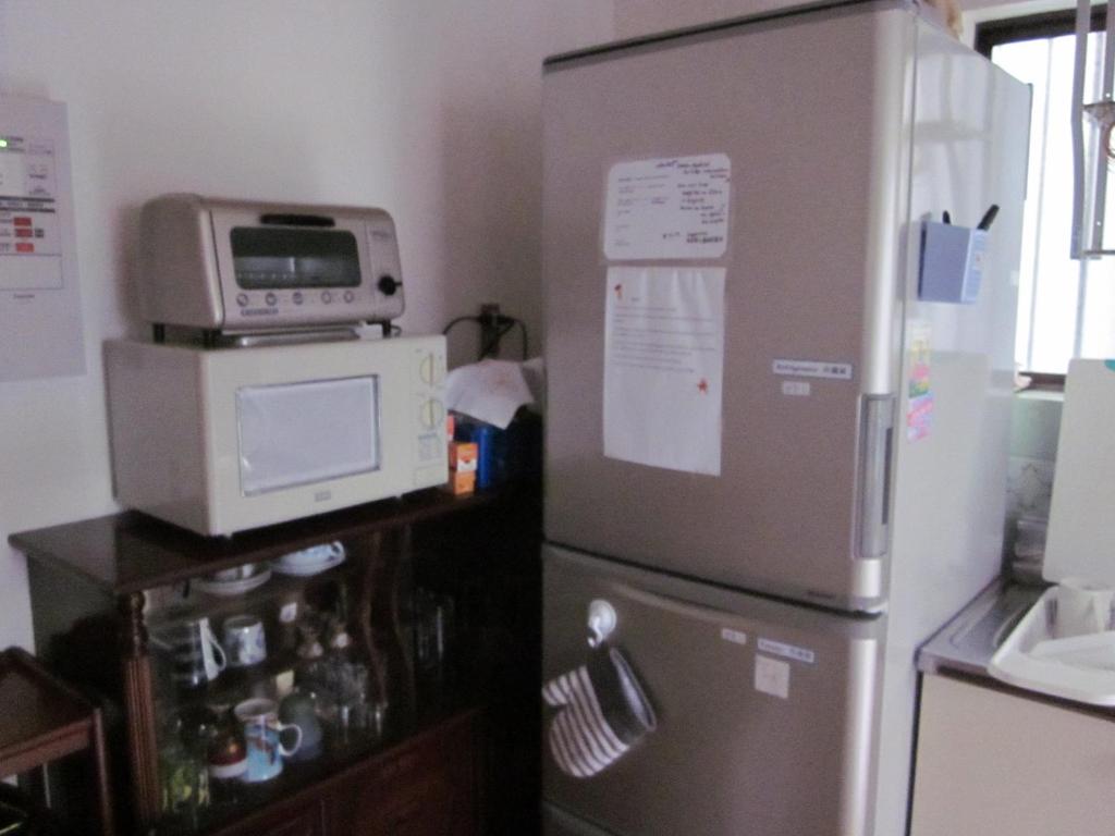 Kuchyň nebo kuchyňský kout v ubytování Enman Guest House Osaka