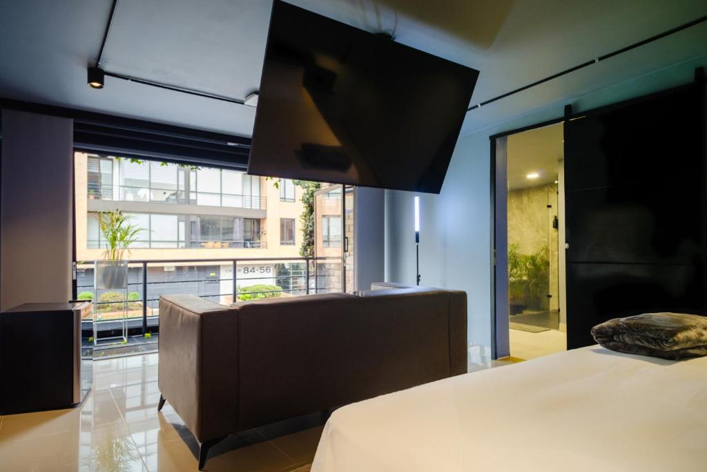 TV a/nebo společenská místnost v ubytování Hostel Joy Calle 85