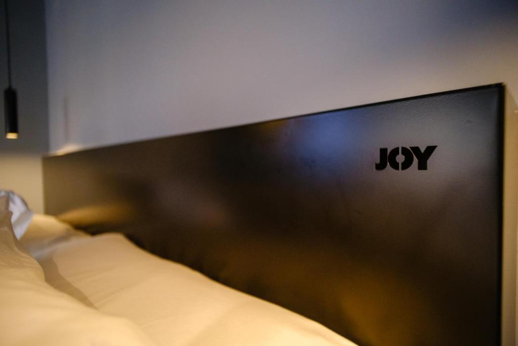 Postel nebo postele na pokoji v ubytování Hostel Joy Calle 85
