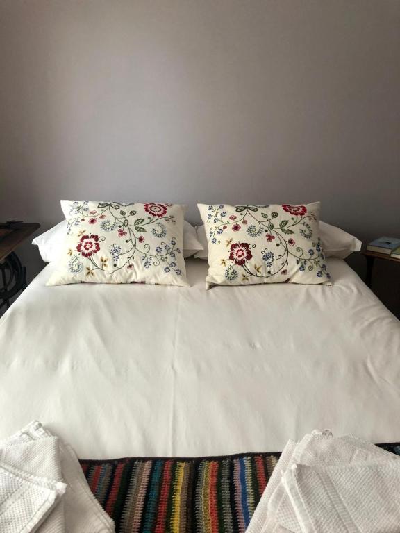 A bed or beds in a room at Maison Bérard