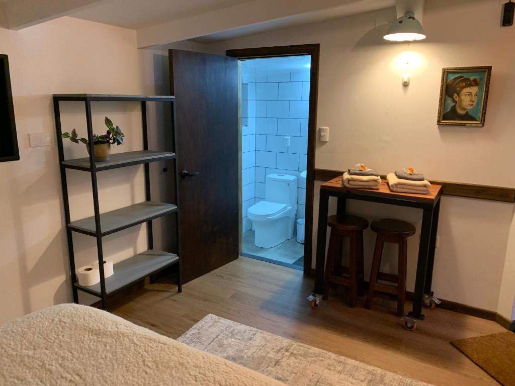 Postel nebo postele na pokoji v ubytování Casa Azul Hostel