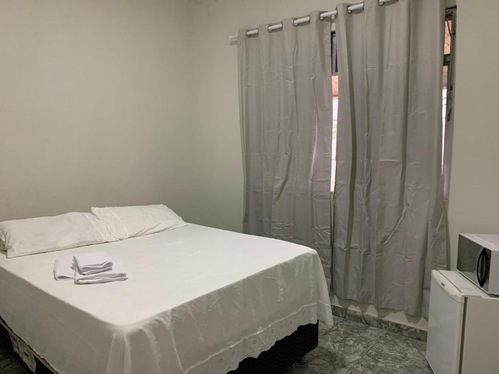 Katil atau katil-katil dalam bilik di Quarto estrela do mar