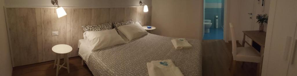 Postel nebo postele na pokoji v ubytování B&B Isa