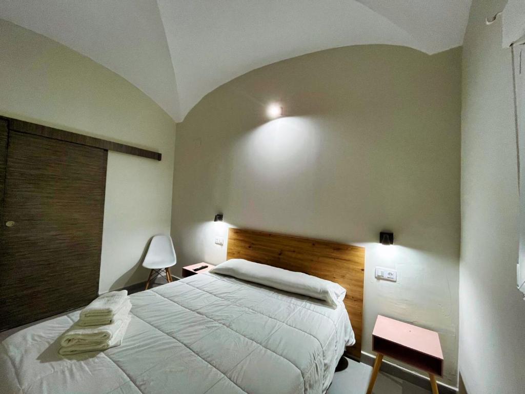 Postel nebo postele na pokoji v ubytování Hostal Pompeya Merida