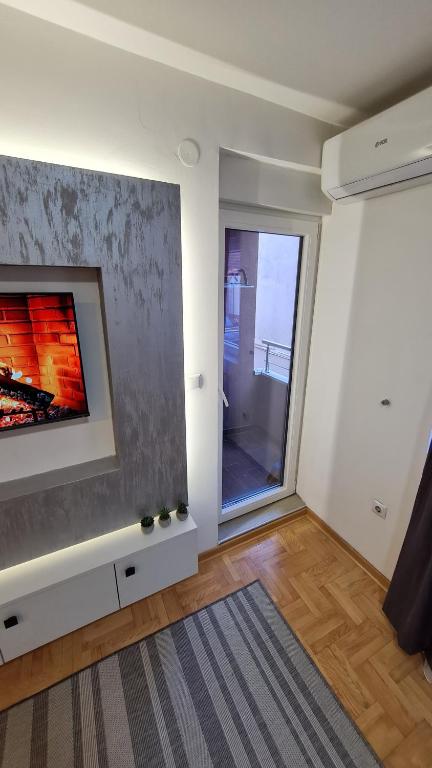 TV a/nebo společenská místnost v ubytování Apartman Filip