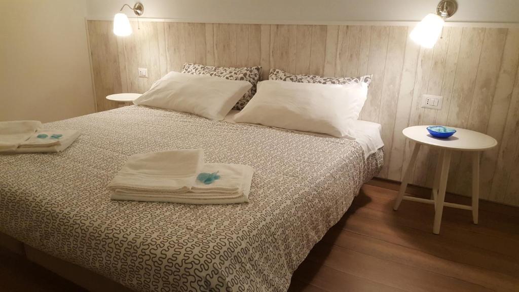 Postel nebo postele na pokoji v ubytování B&B Isa