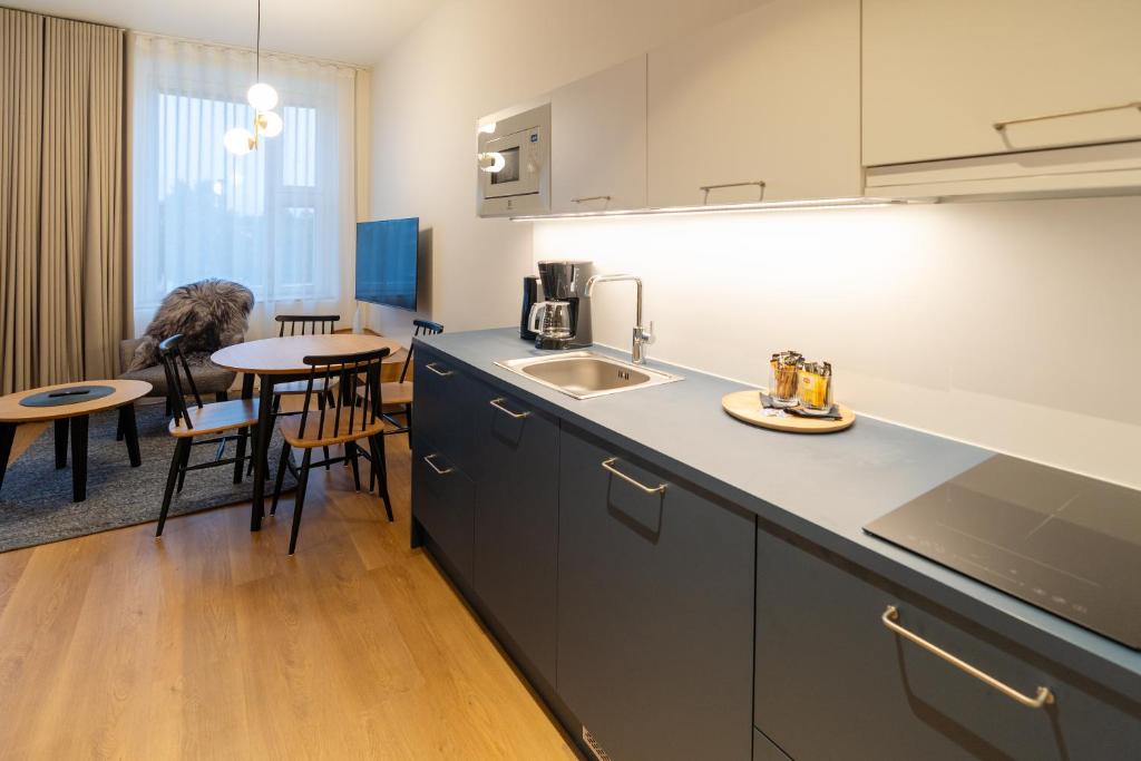 Majoituspaikan Postmaster Hotel keittiö tai keittotila