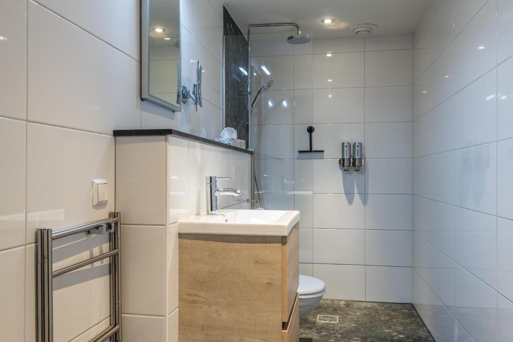 Koupelna v ubytování Hotel Oranjestaete