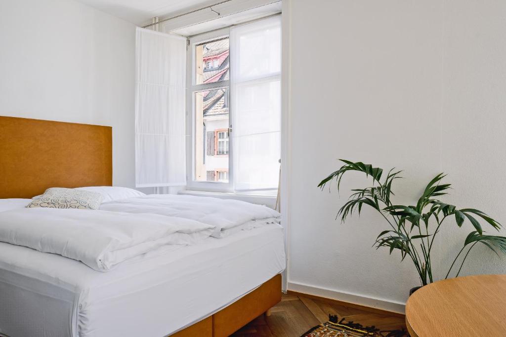 Postel nebo postele na pokoji v ubytování Consum Boutique Hotel