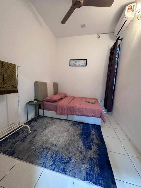 Postel nebo postele na pokoji v ubytování DeCherating privatepool